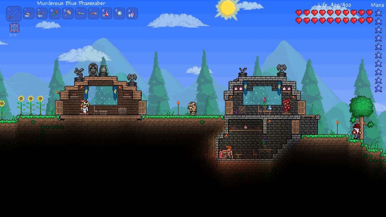 A group of players passing the time in their newly built base in Terraria.