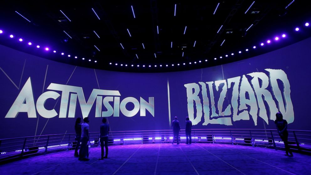 The logos for Activision and Blizzard seen at a gaming event.